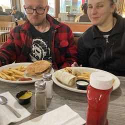 Nana's Pancake Place - Cheeseburger with fries chicken wrap with fries