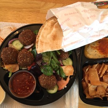 Hummus Pittsburgh - a tray of food and a bag of chips - Falafel Near Me - Pittsburgh, Pennsylvania