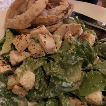 The Bat & Ball Pub - chicken Caesar salad with onion rings garnish - Pubs Near Me - Atlanta, Georgia The Bat & Ball Pub - chicken Caesar salad with onion rings garnish - Pubs Near Me - Atlanta, Georgia