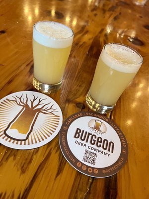 Photo of Burgeon Beer Co - Carlsbad, CA, US. Cosmic Drift Hazy and Juice Press Hazy