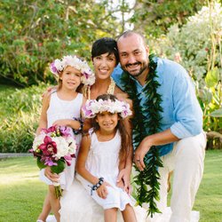 Bloom Kauai - Wedding Day photo including Bridal bouquet with Cymbidium orchids, flower crowns for the girls, and a Maile style Ti Leaf Lei for the Groom.