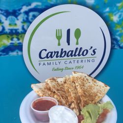Carballo's Catering - Our mouthwatering Chicken Quesadilla served with guacamole, sour cream and salsa.