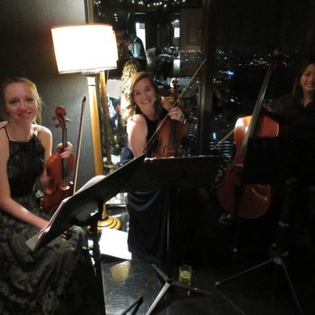 Cobalt Strings - Sarah, Amber, and Juli performing at our 2016 holiday party at The Peachtree Club in Midtown. - Musicians Near Me Cobalt Strings - Sarah, Amber, and Juli performing at our 2016 holiday party at The Peachtree Club in Midtown. - Musicians Near Me