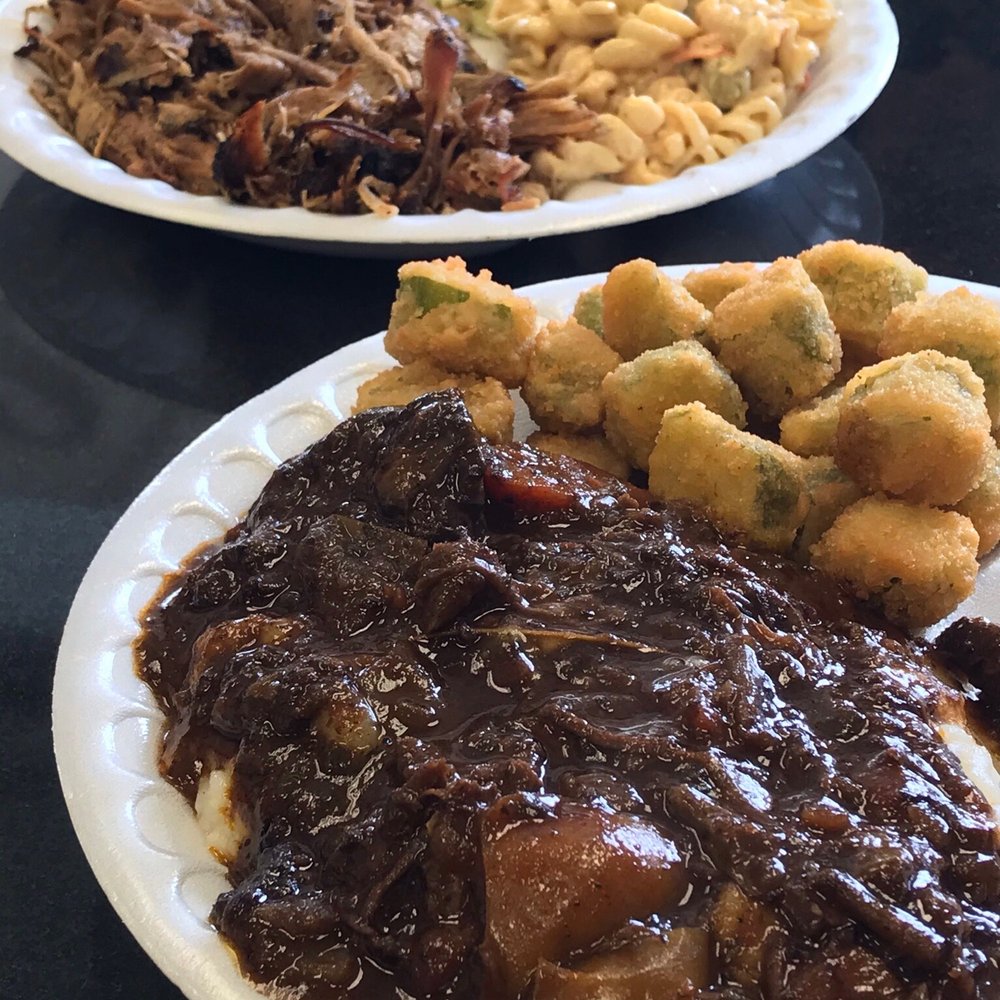Roy's Grille - Front: Braised Beef Cheeks with Okra Back: Pulled Pork with Coleslaw & Pasta Salad - Barbeque Near Me - Irmo, South Carolina Roy's Grille - Front: Braised Beef Cheeks with Okra Back: Pulled Pork with Coleslaw & Pasta Salad - Barbeque Near Me - Irmo, South Carolina