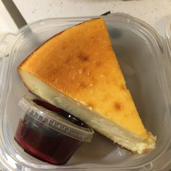 Outback Steakhouse - cheesecake with raspberry sauce - Steakhouses Near Me - Tucson, Arizona Outback Steakhouse - cheesecake with raspberry sauce - Steakhouses Near Me - Tucson, Arizona