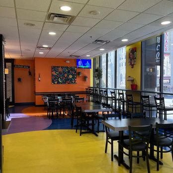 Cinco Mas - tables and chairs in a restaurant - Mexican Near Me - Columbus, Ohio Cinco Mas - tables and chairs in a restaurant - Mexican Near Me - Columbus, Ohio