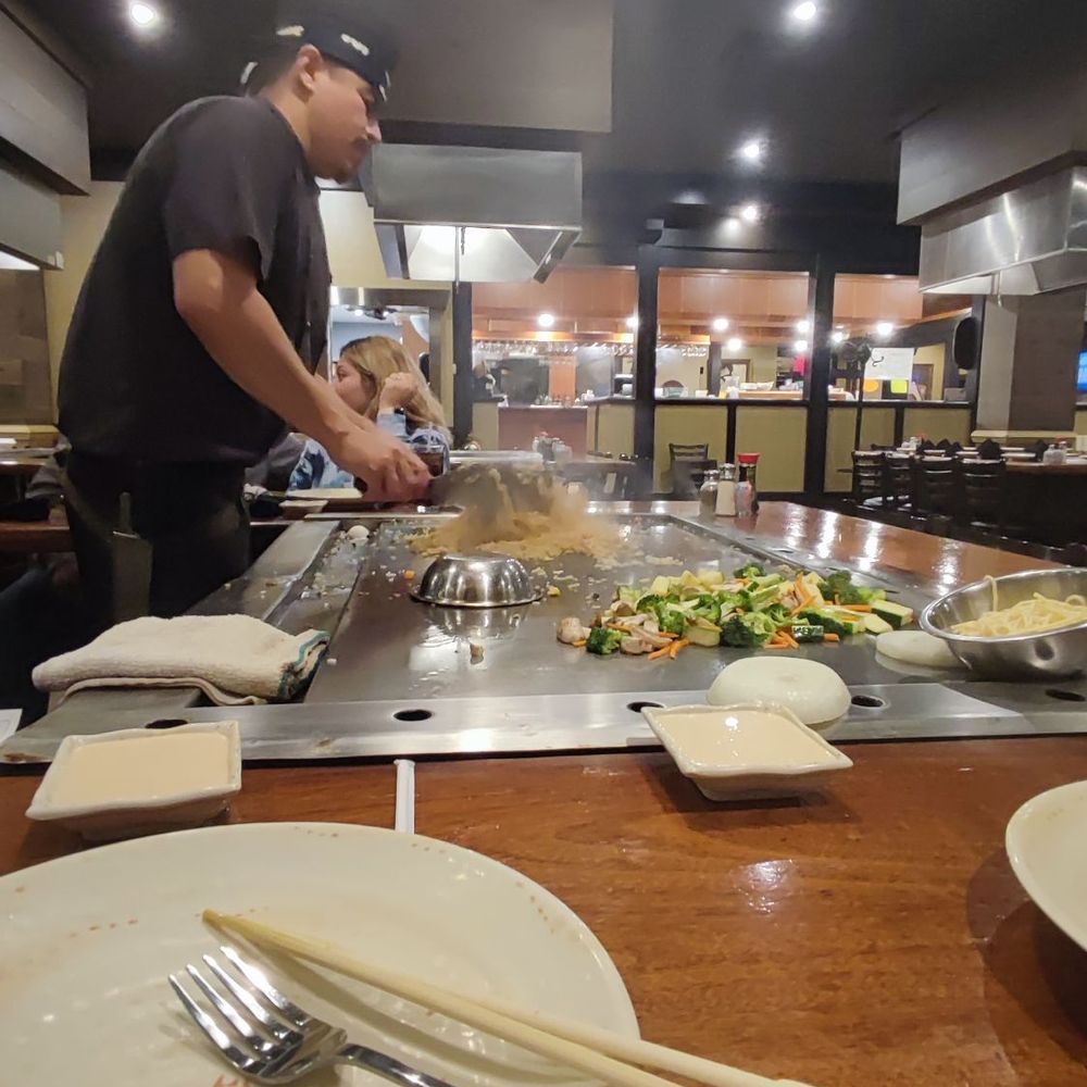 Sakura - Chef cooking is fried rice - Japanese Near Me - Woodbridge, Virginia Sakura - Chef cooking is fried rice - Japanese Near Me - Woodbridge, Virginia