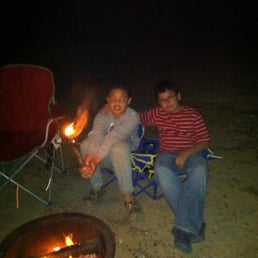 Kids roasting marshmallows.