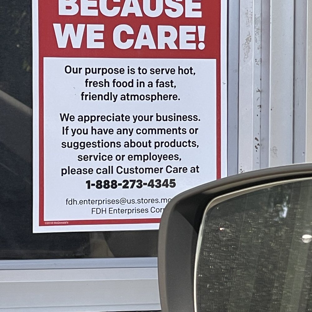 a sign in the window of a restaurant