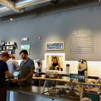 Pepita Coffee - The ordering counter, with the pared down menu in the back and baked goods (now made in-house) in front / July 2019 - Coffee & Tea Near Me - Cambridge, Massachusetts