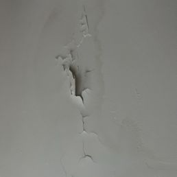 After the ceiling kept leaking heres what they are left with .  Did not follow up on us the day after arrival.