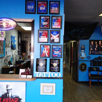 Immortal Ink - Newly updated Lobby Photo, the bottom 2 Black Plaques are from Google for 5 Star Reviews, this website is a joke and refuses our Reviews - Piercing Near Me - Jonesboro, Arkansas Immortal Ink - Newly updated Lobby Photo, the bottom 2 Black Plaques are from Google for 5 Star Reviews, this website is a joke and refuses our Reviews - Piercing Near Me - Jonesboro, Arkansas