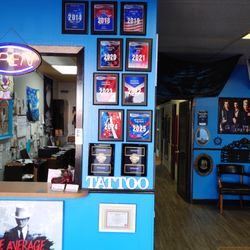 Immortal Ink - Newly updated Lobby Photo, the bottom 2 Black Plaques are from Google for 5 Star Reviews, this website is a joke and refuses our Reviews