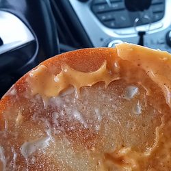 McDonald's - AThis is the inside breakfast bagel cheese eggs sausage it was so hard I got two of them I made a complaint and haven't heard back from them