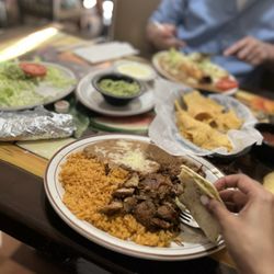 Lorenas Mexican Restaurant - Carnitas, chimichanga, guac and queso dip.