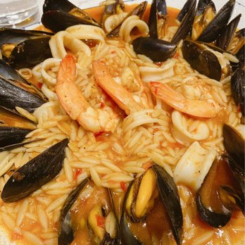 Our Mom Eugenia - Shirlington - a plate of pasta with shrimp and musselling - Greek Near Me - Arlington, Virginia Our Mom Eugenia - Shirlington - a plate of pasta with shrimp and musselling - Greek Near Me - Arlington, Virginia