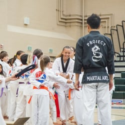 My sister receiving her black belt at a special ceremony dedicated to the nw black belts.