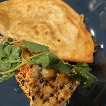 The Jolly Roger - Chicken quesadilla and smoked elote - Food Trucks Near Me The Jolly Roger - Chicken quesadilla and smoked elote - Food Trucks Near Me