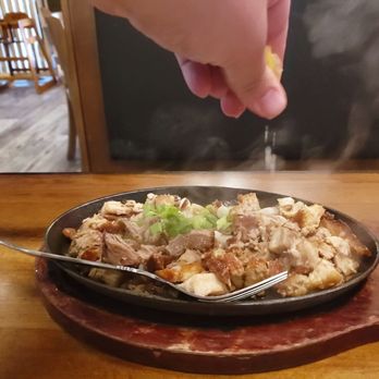 Max's Restaurant - Seattle - Sizzling Lechon Kawali Sisig topped with lemon juice. - Filipino Near Me - Tukwila, Washington