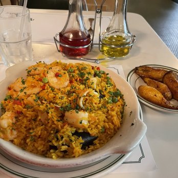 Versailles - Seafood paella and fried. Bananas. - Cuban Near Me - Miami, Florida Versailles - Seafood paella and fried. Bananas. - Cuban Near Me - Miami, Florida