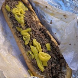 Large Cheesesteak with onions and hot peppers. Cost $12.95.
