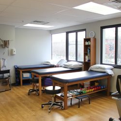 Paggi Physical Therapy & Sports Rehabilitation - Treatment Area - our clinic provides an open and friendly atmosphere with comfortable treatment tables and many educational resources.