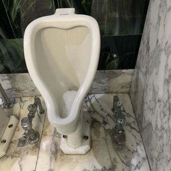 Palacio de Bellas Artes - A foot operated flush for the urinal! I've never seen this in my life. - Art Museums Near Me - Cuidad de México, DIF