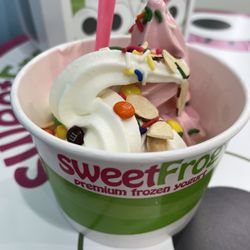 SweetFrog Premium Frozen Yogurt - Tart and strawberry in a medium cup