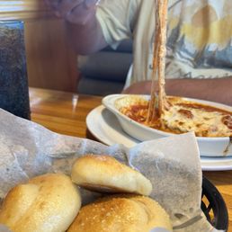 Cheesy lasagna and garlicky rolls. Yum! Cheesy lasagna and garlicky rolls. Yum!