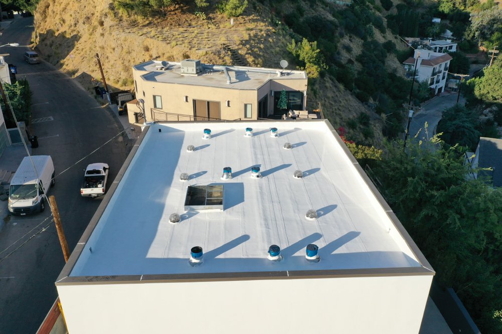 Slide of EVG Roofing Systems