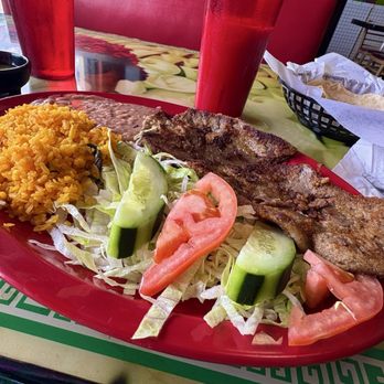 El Huarache Azteca - Milanesa de res with all of the fixings - Mexican Near Me - Clearwater, Florida El Huarache Azteca - Milanesa de res with all of the fixings - Mexican Near Me - Clearwater, Florida