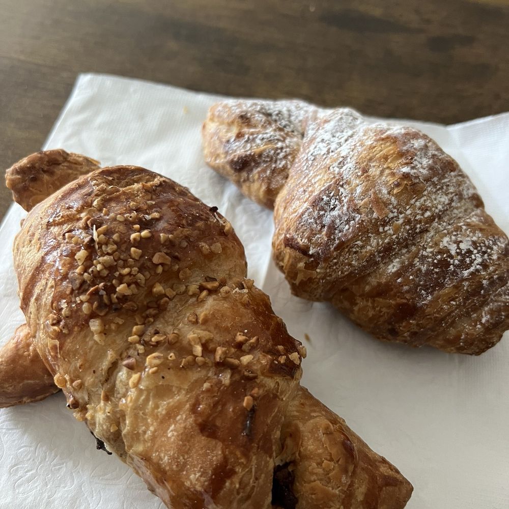 Hendrickx Belgian Bread Crafter - Hazelnut croissant (front) and chocolate croissant (back) - Bakeries Near Me - Chicago, Illinois Hendrickx Belgian Bread Crafter - Hazelnut croissant (front) and chocolate croissant (back) - Bakeries Near Me - Chicago, Illinois