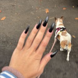 GelX nails (long stilettos shaped to be thinner and slightly more rounded at the top)
