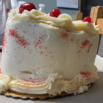 Wheatfields Eatery and Bakery - lop sided cake. - American Near Me - Omaha, Nebraska