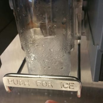 McDonald's - a hand holding a bottle of ice - Burgers Near Me - Decatur, Illinois McDonald's - a hand holding a bottle of ice - Burgers Near Me - Decatur, Illinois