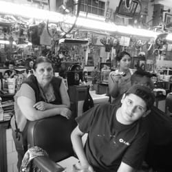 Jesse’s Barber Shop - To the left Juanita owner and wife to Jesse