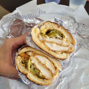 Lenwich - a person holding a sandwich in their hand - Breakfast & Brunch Near Me - New York, New York
