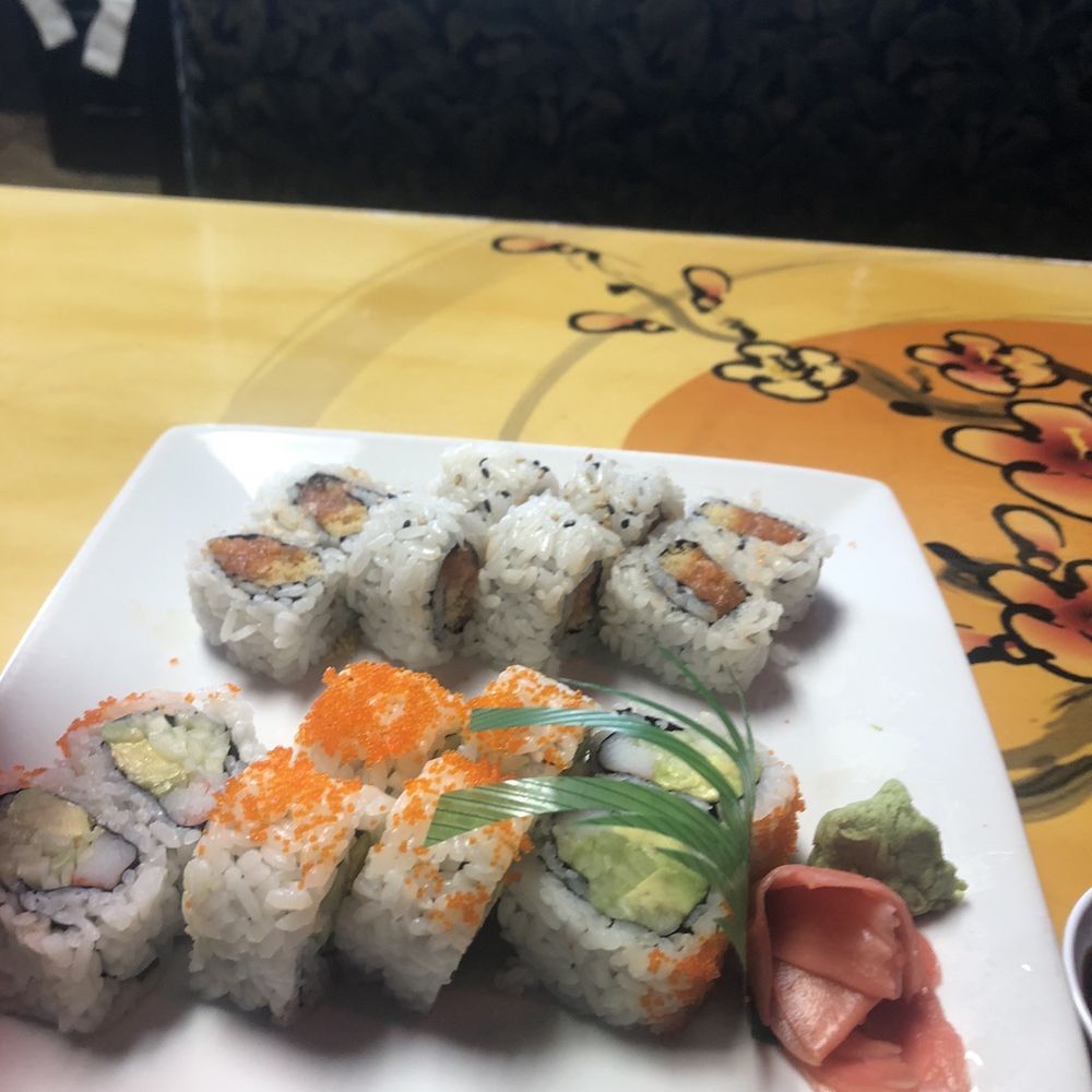 Umai Sushi - Lunch special sushi. California roll on the bottom and spicy salmon crunch roll on the top. - Sushi Bars Near Me - Largo, Florida Umai Sushi - Lunch special sushi. California roll on the bottom and spicy salmon crunch roll on the top. - Sushi Bars Near Me - Largo, Florida