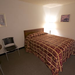 Room 105. New pillow-top mattress and new comforter.