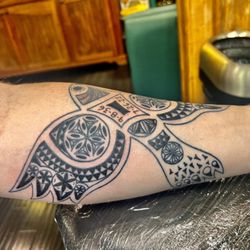 Electric Dagger Tattoo - A Finnish Sielulintu, or Soul Bird, with Finnish Distaff carving attributes.