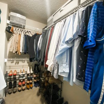 Kyla Barrett - Organized walk-in closet. - Home Organization Near Me Kyla Barrett - Organized walk-in closet. - Home Organization Near Me