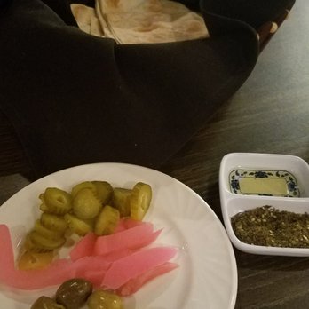 Open Sesame - Complimentary pita bread, green olives, and pickled vegetables - Lebanese Near Me - Dallas, Texas