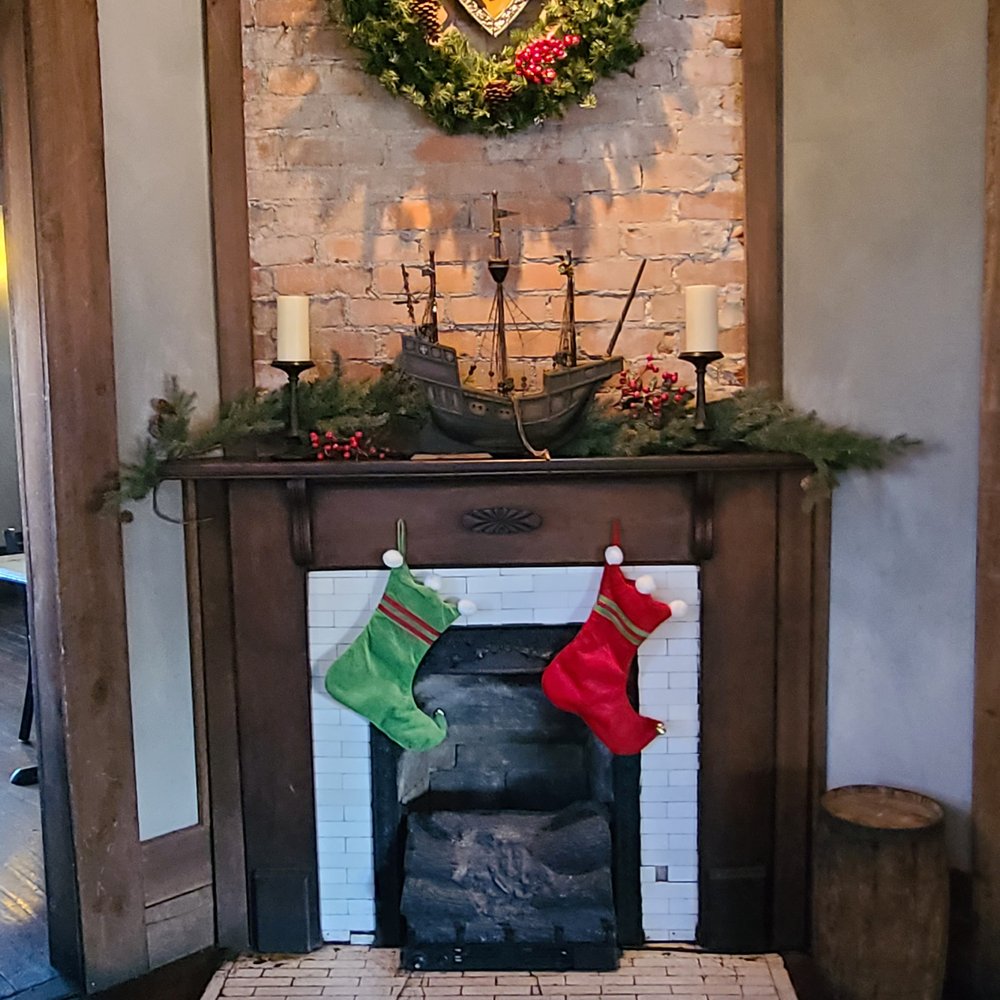 Floyd County Brewing Company - Yule decorations on the fireplace. - Brewpubs Near Me - New Albany, Indiana Floyd County Brewing Company - Yule decorations on the fireplace. - Brewpubs Near Me - New Albany, Indiana
