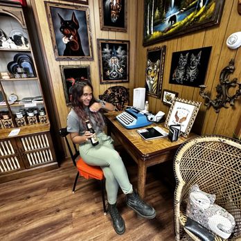 Cat's Luck - a woman sitting at a desk - Vegan Near Me - Neptune City, New Jersey Cat's Luck - a woman sitting at a desk - Vegan Near Me - Neptune City, New Jersey