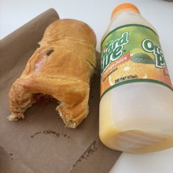 Hill Country Donuts & Kolaches - Kolache is as big as this bottle! Minus a bite.