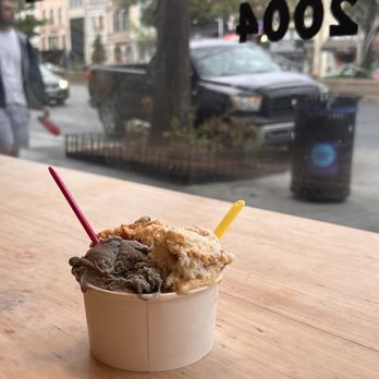 Dolcezza - A large gelato cup with black sesame, coconut dulce de leche, and peanut butter cup - Coffee & Tea Near Me - Washington, DC, District of Columbia