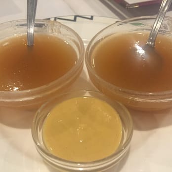 Tsang's Cafe - A sweet, fruity sauce and mustard that were served for the meal.  We didn't use the sweet sauce. - Chinese Near Me - Duxbury, Massachusetts