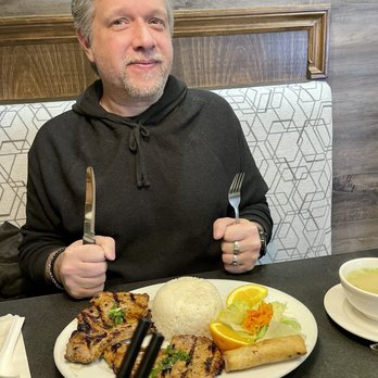 Cô Đô Hue - Pork chops with broken rice tender and tasty. Came with a small bowl of clear soup. I gave him one of my spring rolls. - Vietnamese Near Me - Edmonton, Alberta Cô Đô Hue - Pork chops with broken rice tender and tasty. Came with a small bowl of clear soup. I gave him one of my spring rolls. - Vietnamese Near Me - Edmonton, Alberta