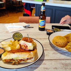 Beaunique Latin Kitchen - Empanadas and tostones, Cuban sandwich with yucca fries