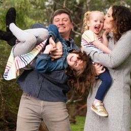 Family photo outdoors with two young children Family photo outdoors with two young children